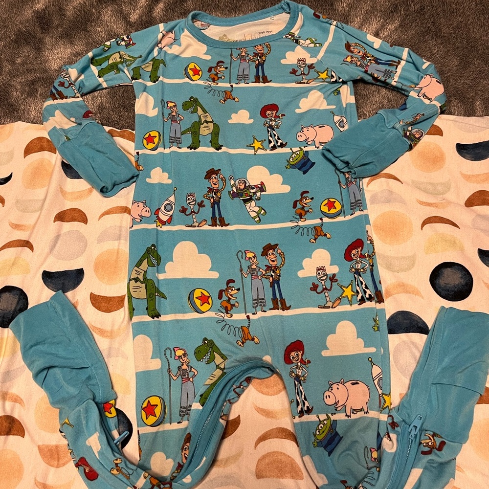 Little sleepies Toy Story crescent zippy
